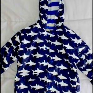 Blue rain coats with sharks